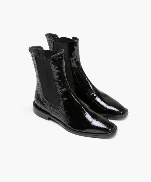 Black embossed patent leather Chelsea boots